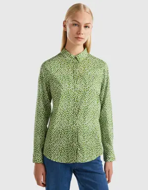 green shirt with white polka dots