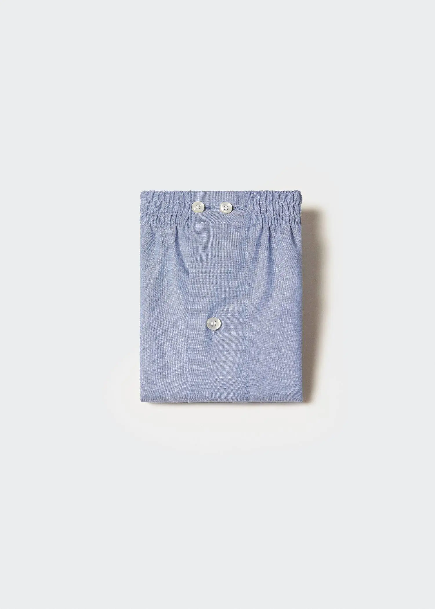 Mango 100% cotton plain briefs. a pair of blue boxer shorts on a white background. 