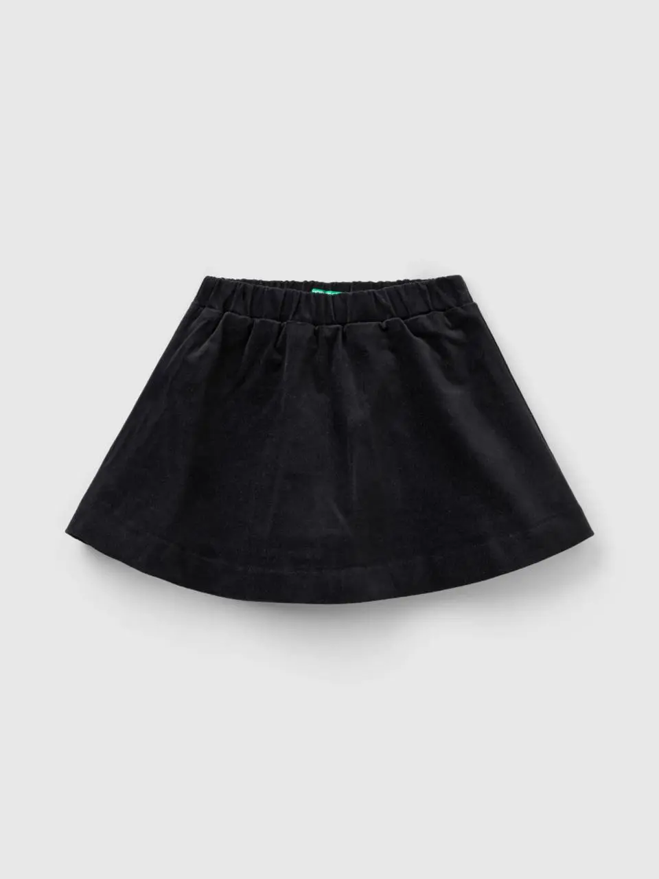 Benetton smooth velvet mini skirt. 1