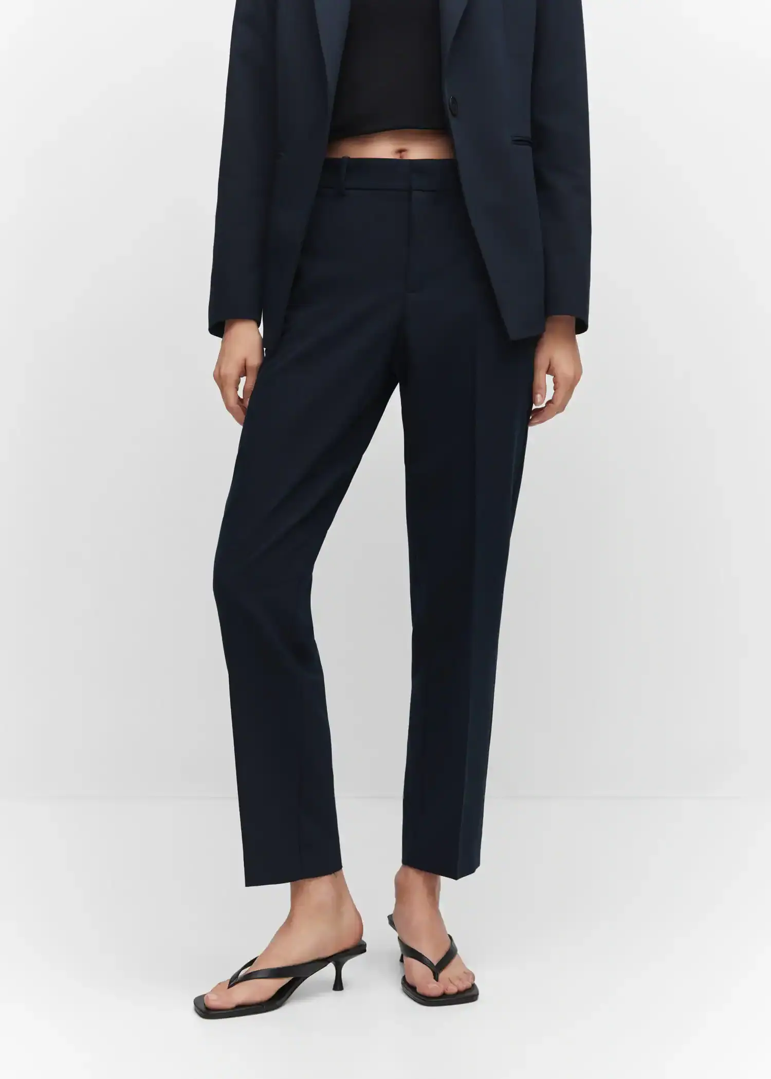 Mango Straight suit trousers. a person wearing a suit and a pair of pants. 