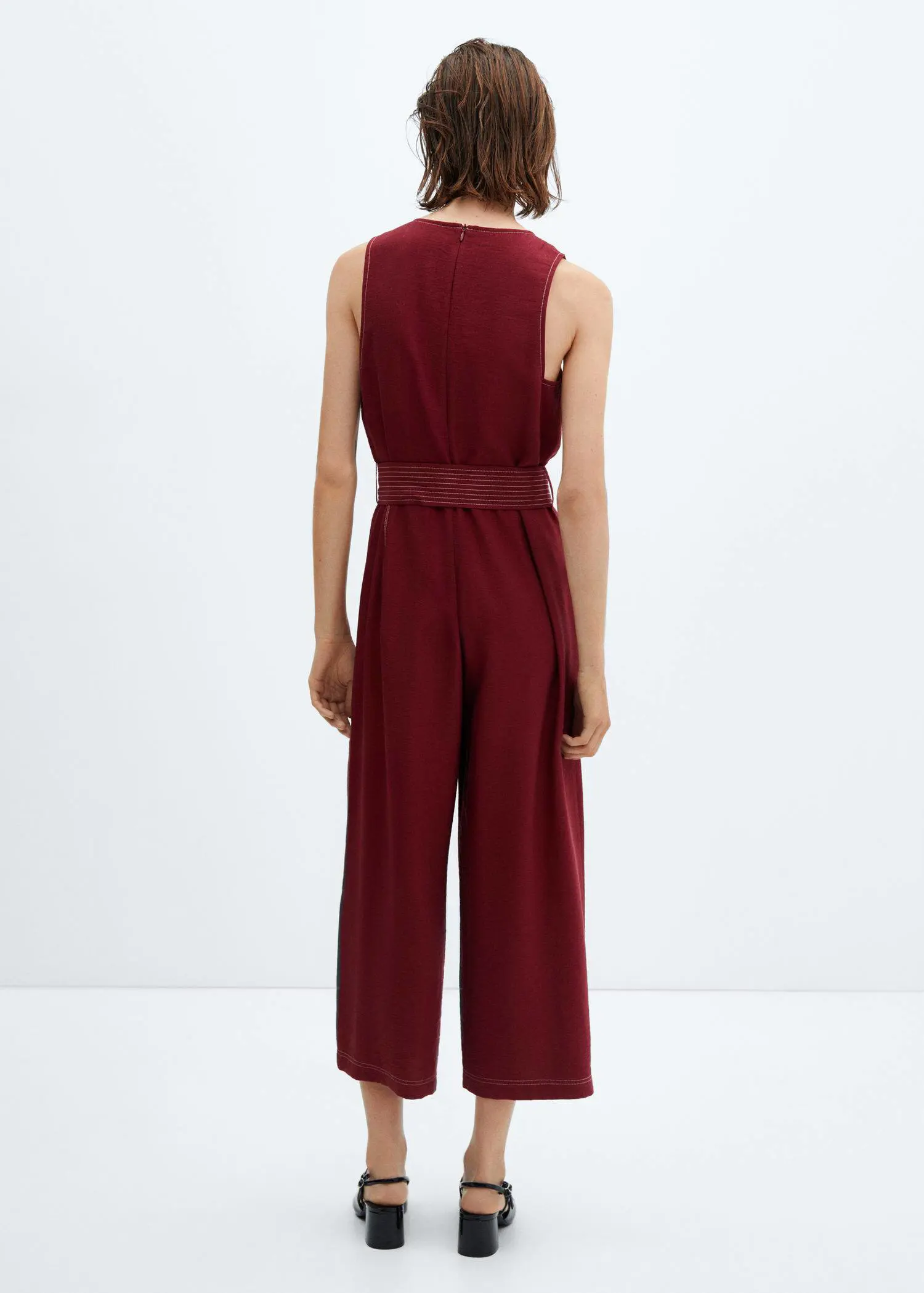 Mango Jumpsuit with seams, belt and bow. 3