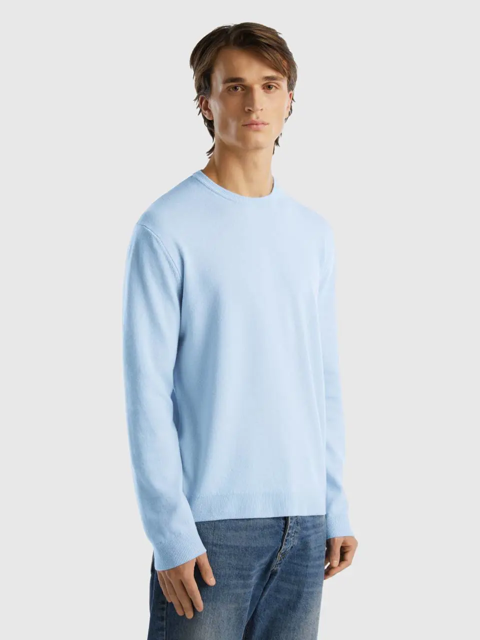 Benetton light blue crew neck sweater in pure merino wool. 1