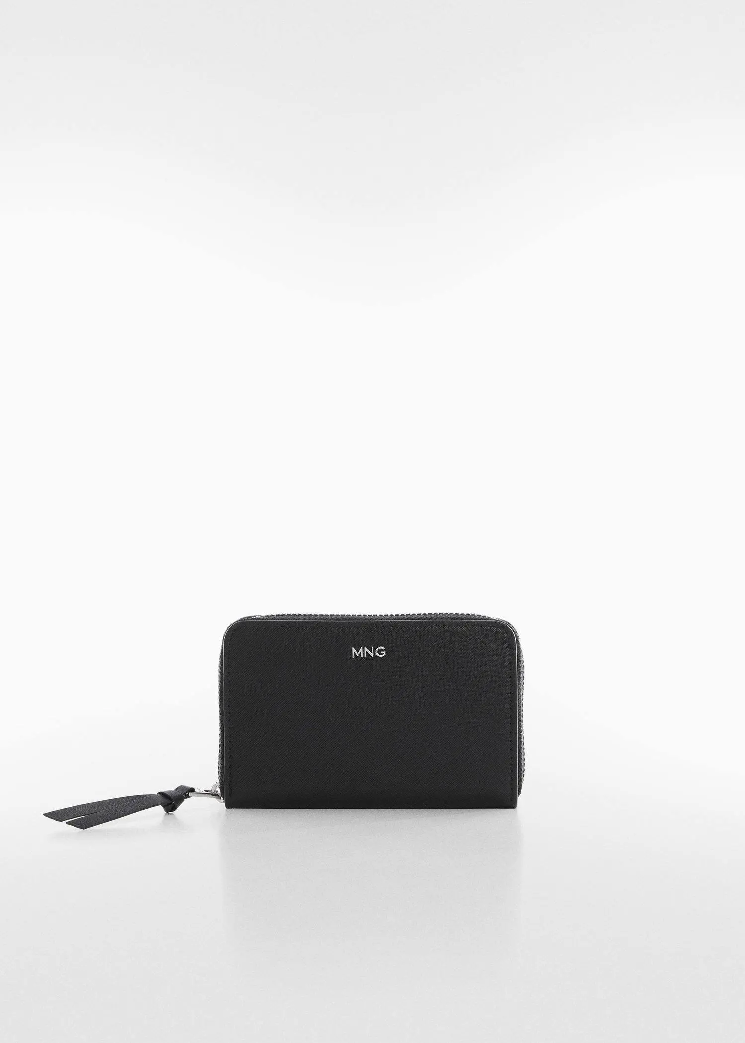 Mango Saffiano-effect wallet. a black purse sitting on top of a white table. 