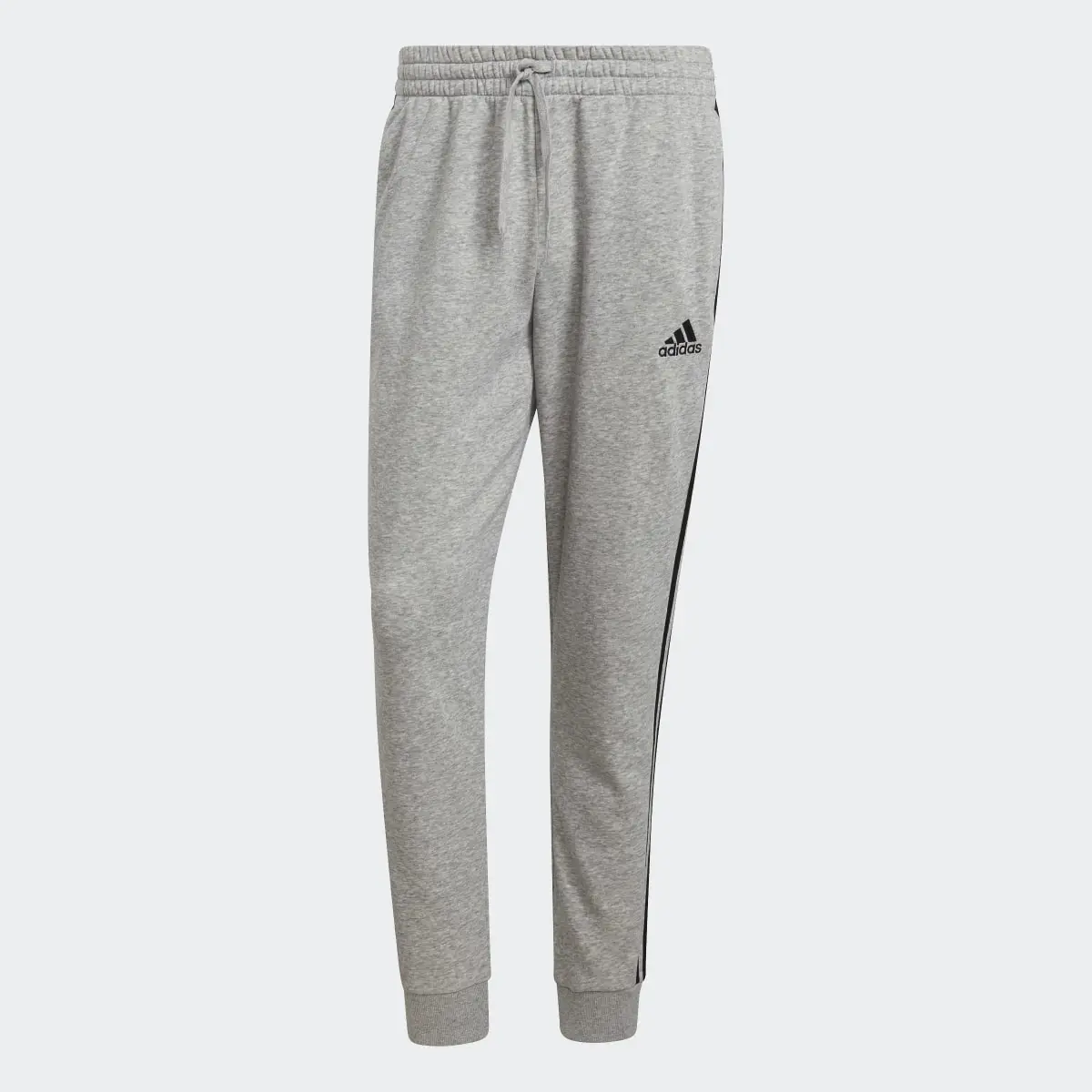 Adidas Essentials Fleece Tapered Cuff 3-Stripes Joggers. 1