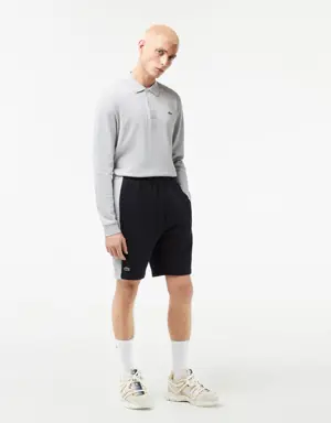 Lacoste Pantalón corto de hombre regular fit en felpa de algodón color block