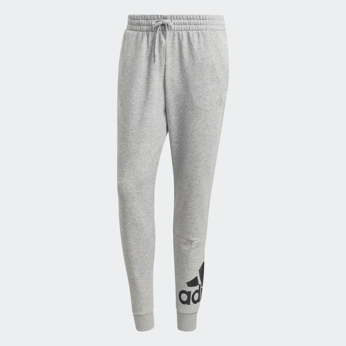 Adidas Essentials French Terry Tapered Cuff Logo Pants. 1