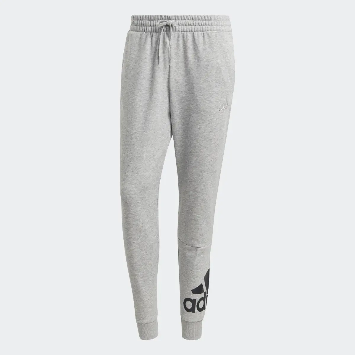 Adidas Essentials French Terry Tapered Cuff Logo Joggers. 1