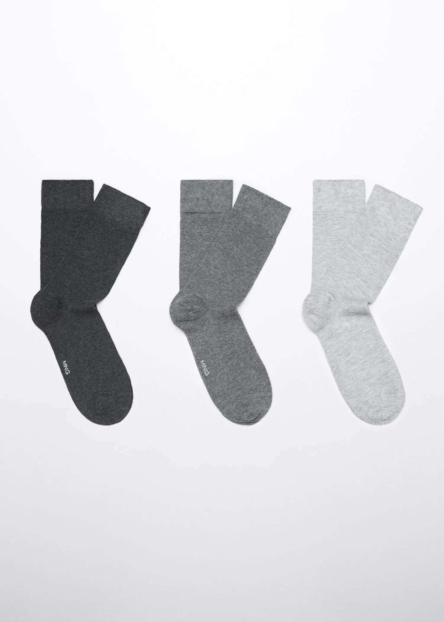 Mango Pack of 3 cotton socks. three pairs of socks in different colors on a white surface. 