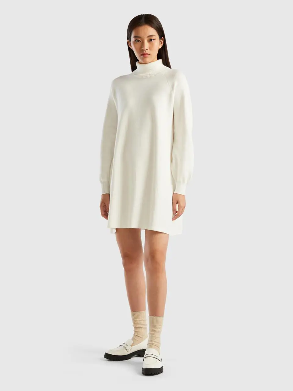 Benetton knit dress with high neck. 1