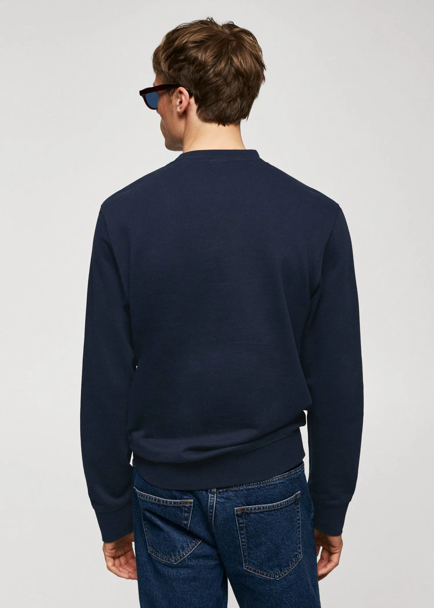 Mango 100% cotton basic sweatshirt . a man wearing a hat and a sweater. 