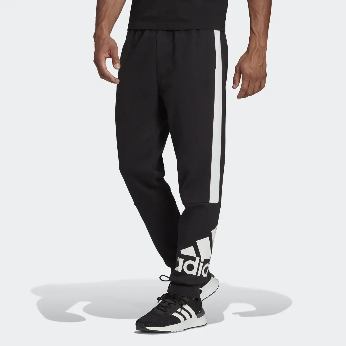 Adidas Essentials Colorblock Fleece Pants. 1