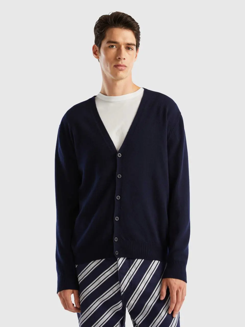 Benetton dark blue v-neck cardigan in pure merino wool. 1