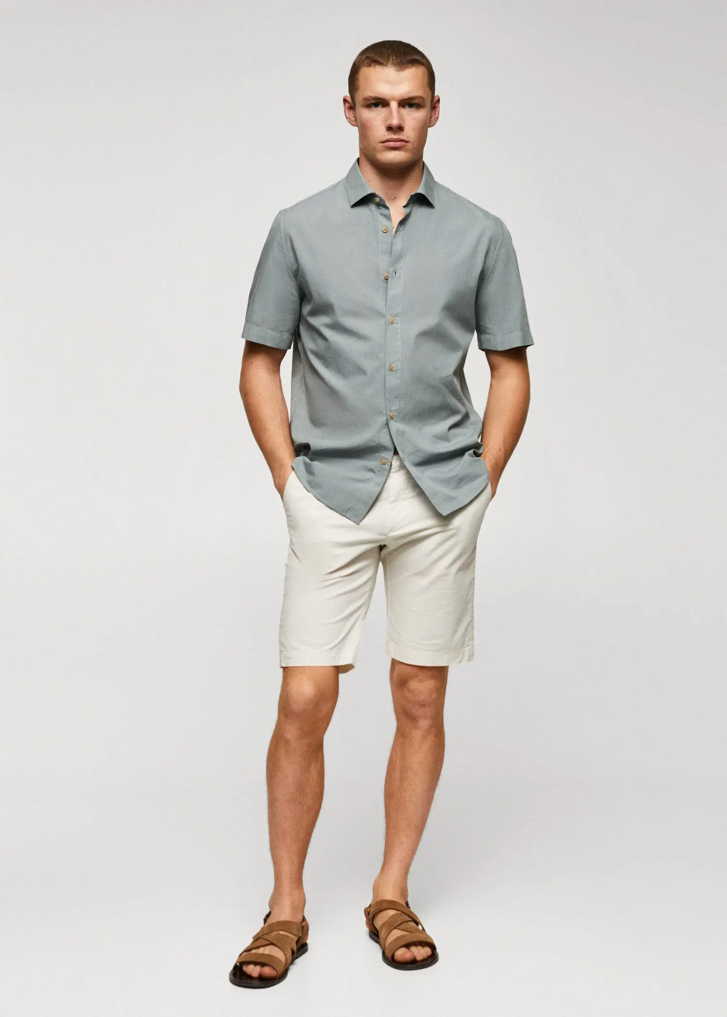 Mango Lightweight cotton shirt . a man in shorts and a button up shirt. 