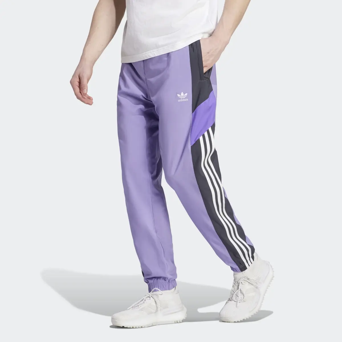 Adidas Rekive Woven Track Pants. 1