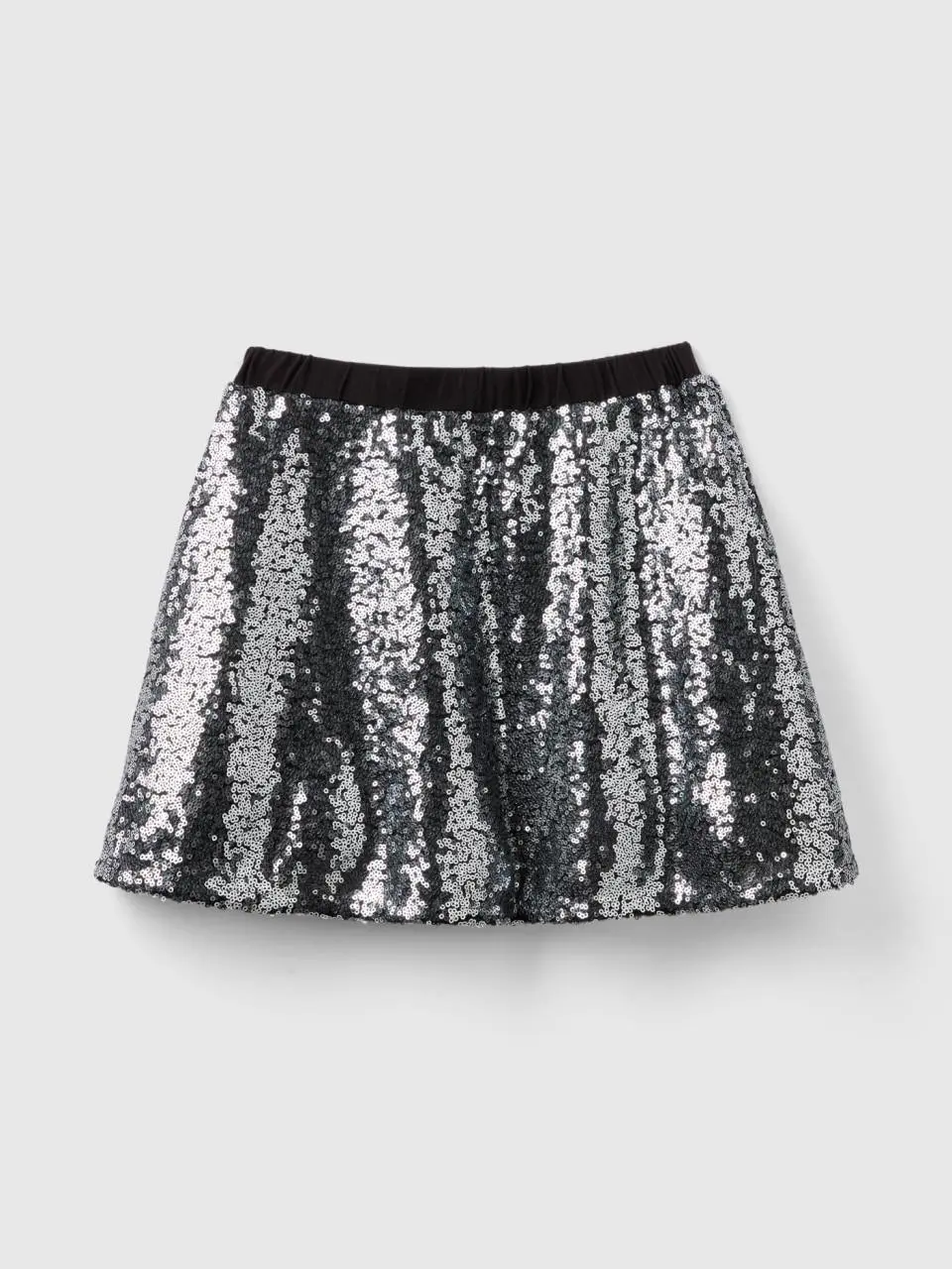 Benetton mini skirt with sequins. 1