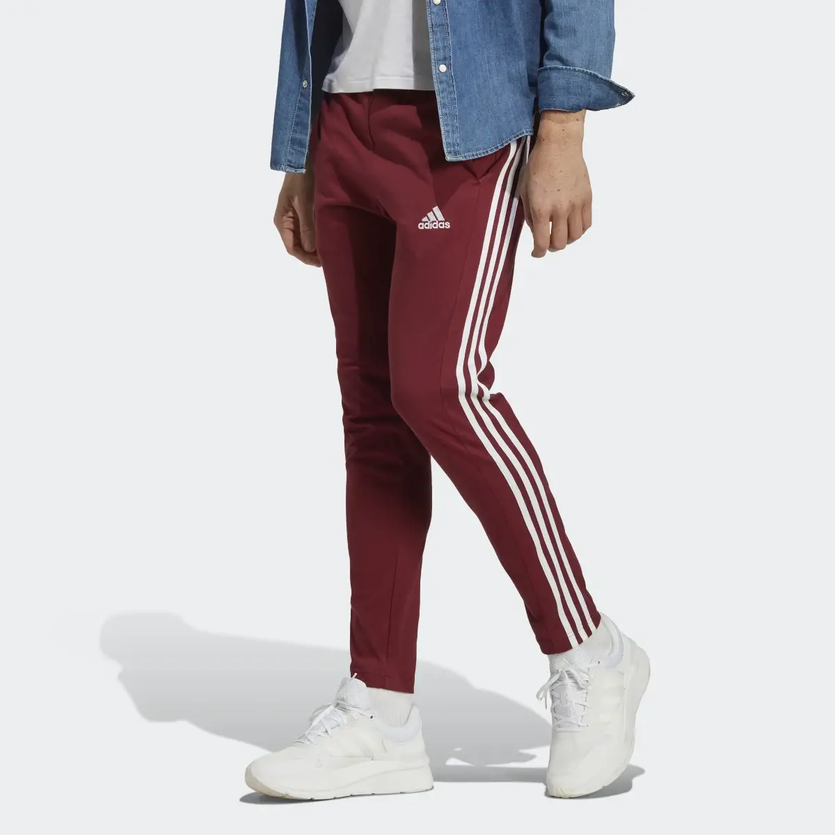 Adidas Pants Essentials 3 Franjas Tejido Jersey Dobladillo Abierto. 1