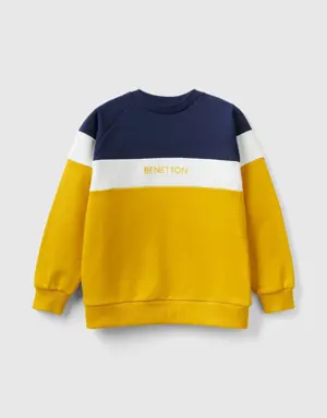 yellow ochre and dark blue sweatshirt with embroidered logo