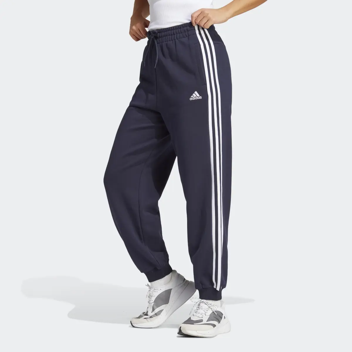 Adidas Essentials 3-Stripes French Terry Loose-Fit Pants. 1