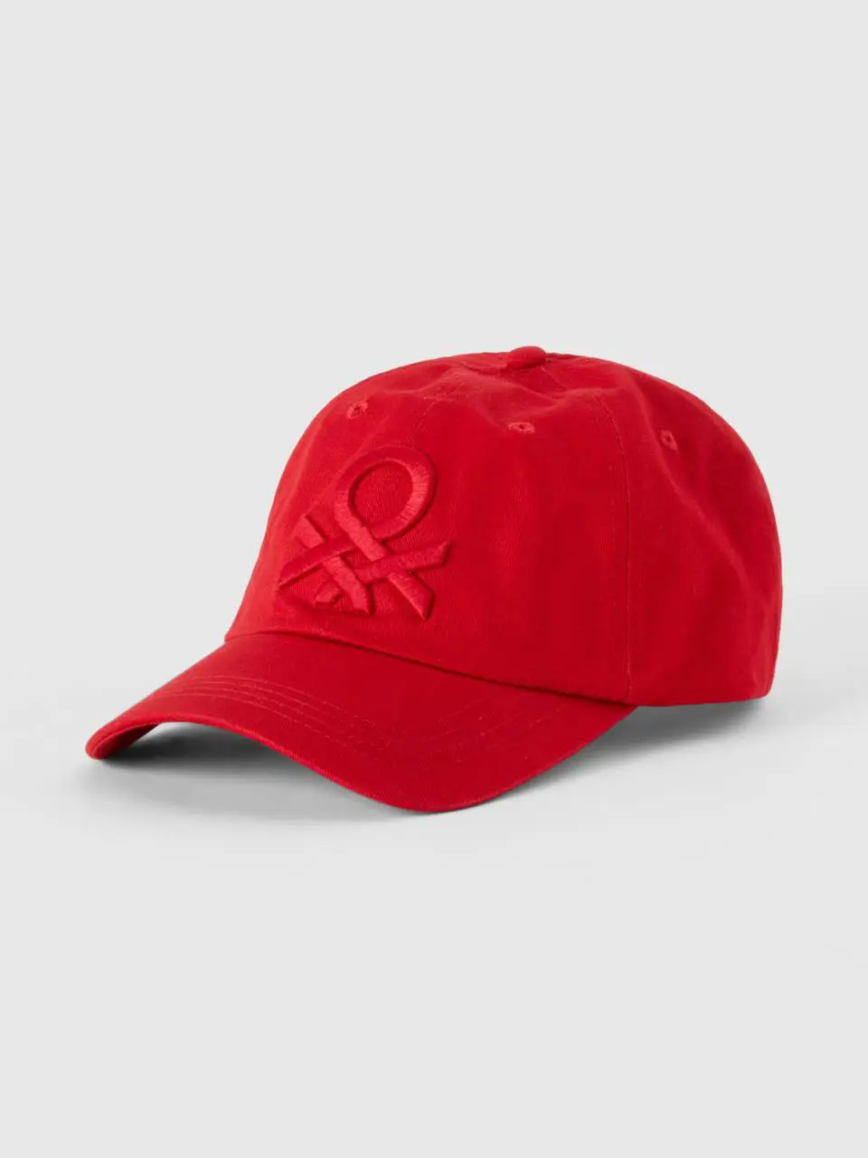 Benetton red baseball cap with washed look. 1