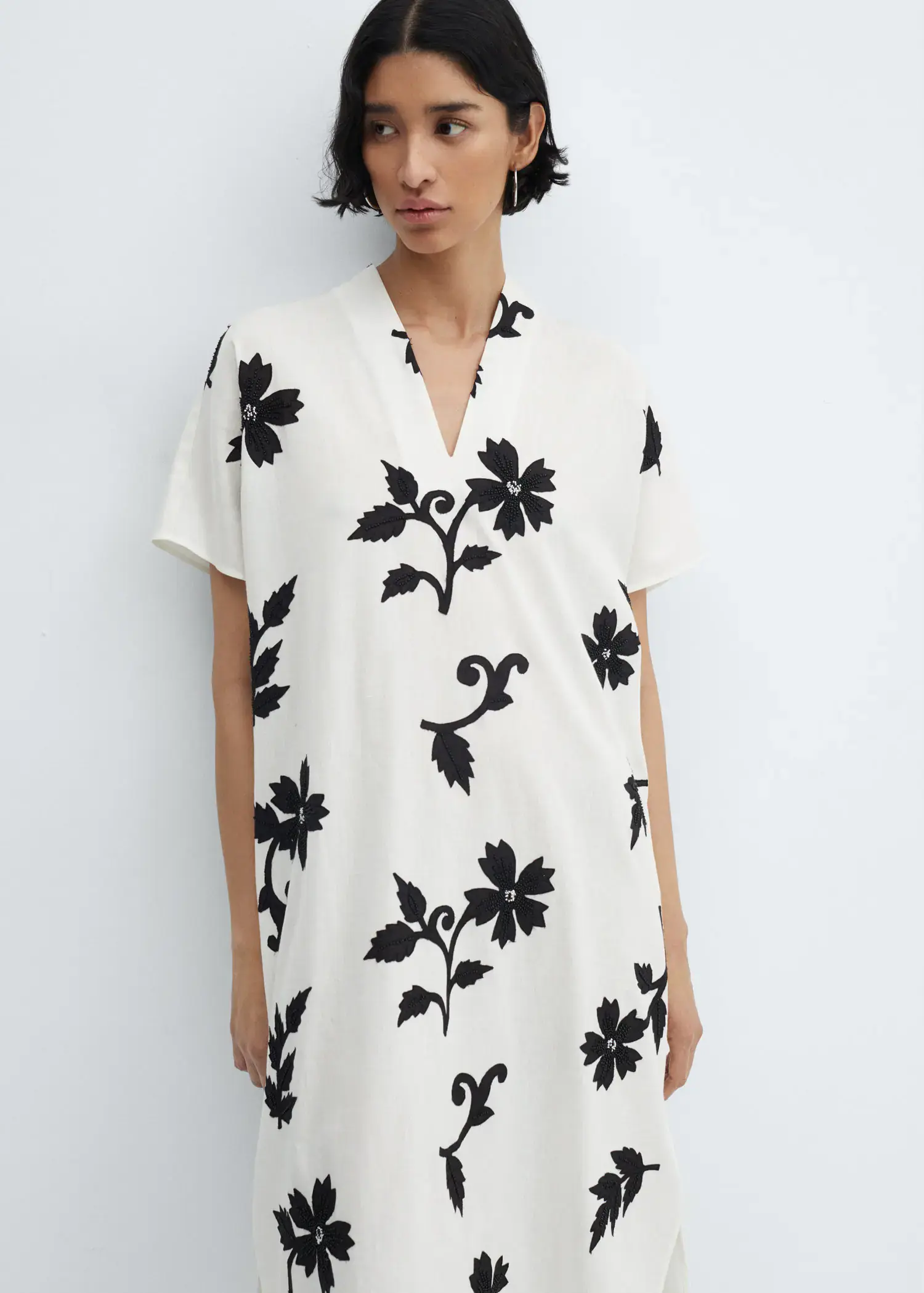 Mango V-neck floral dress. 2