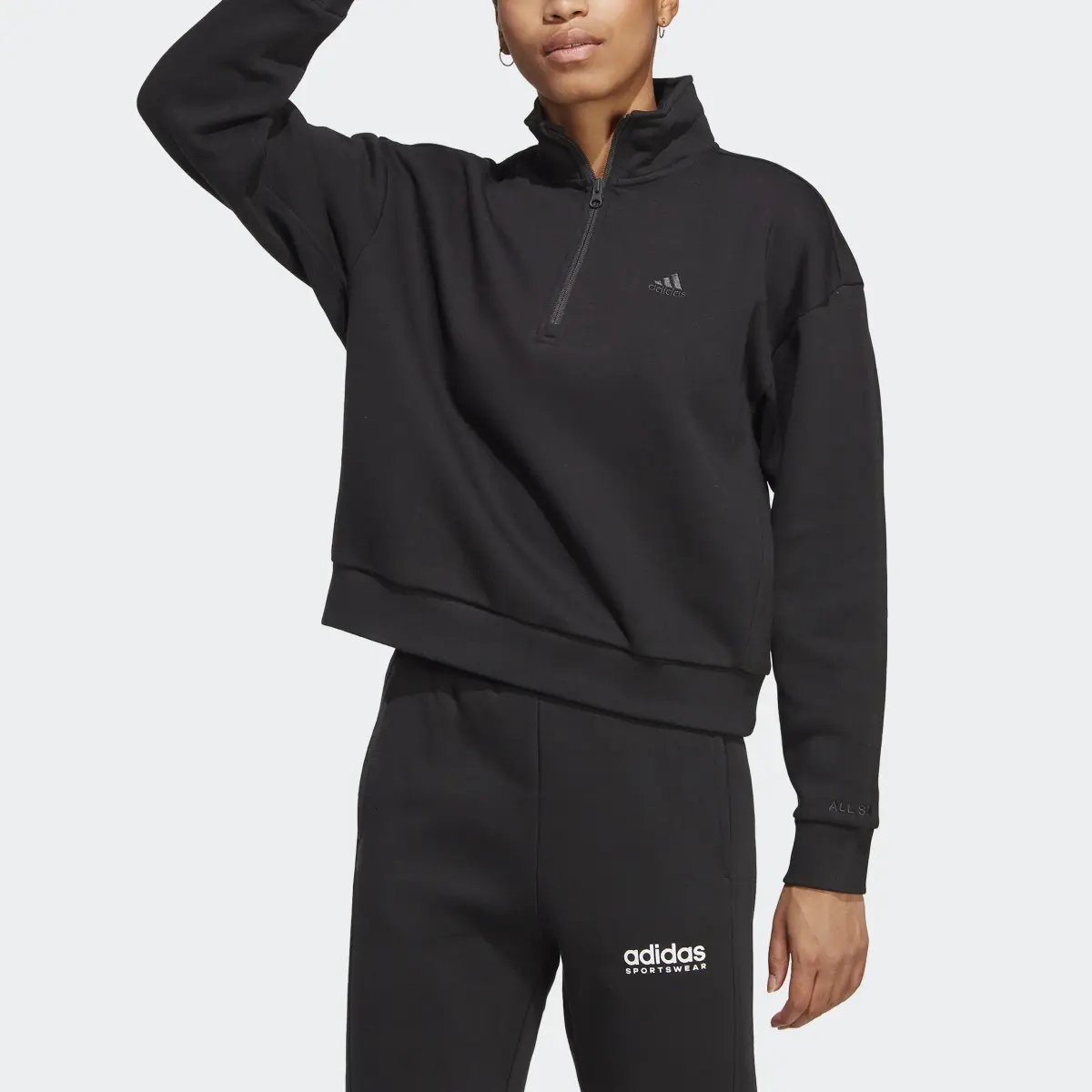 Adidas ALL SZN Fleece Graphic Quarter-Zip Sweatshirt. 1
