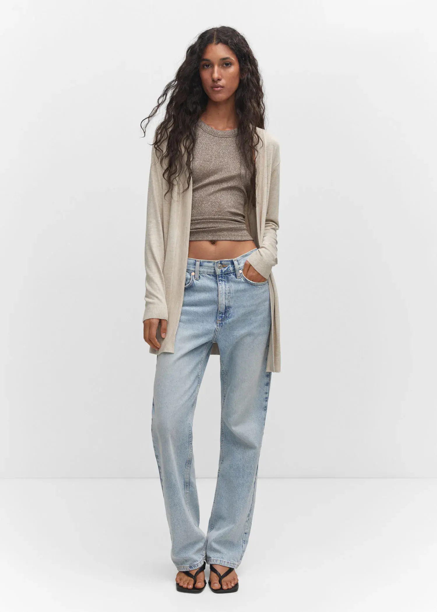 Mango Fine-knit cardigan. a woman in a tan top and jeans. 