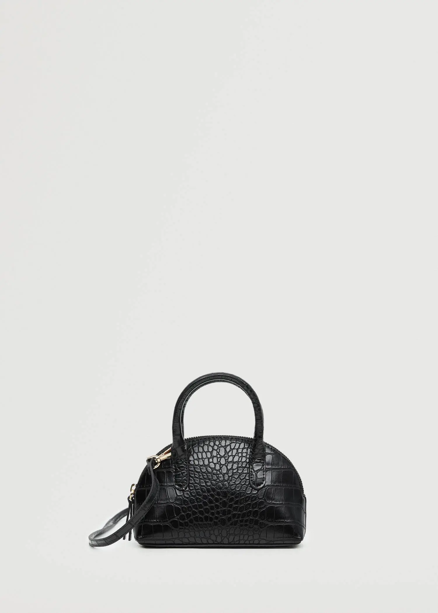 Mango Crossbody mini bag. a black purse is shown against a white background. 