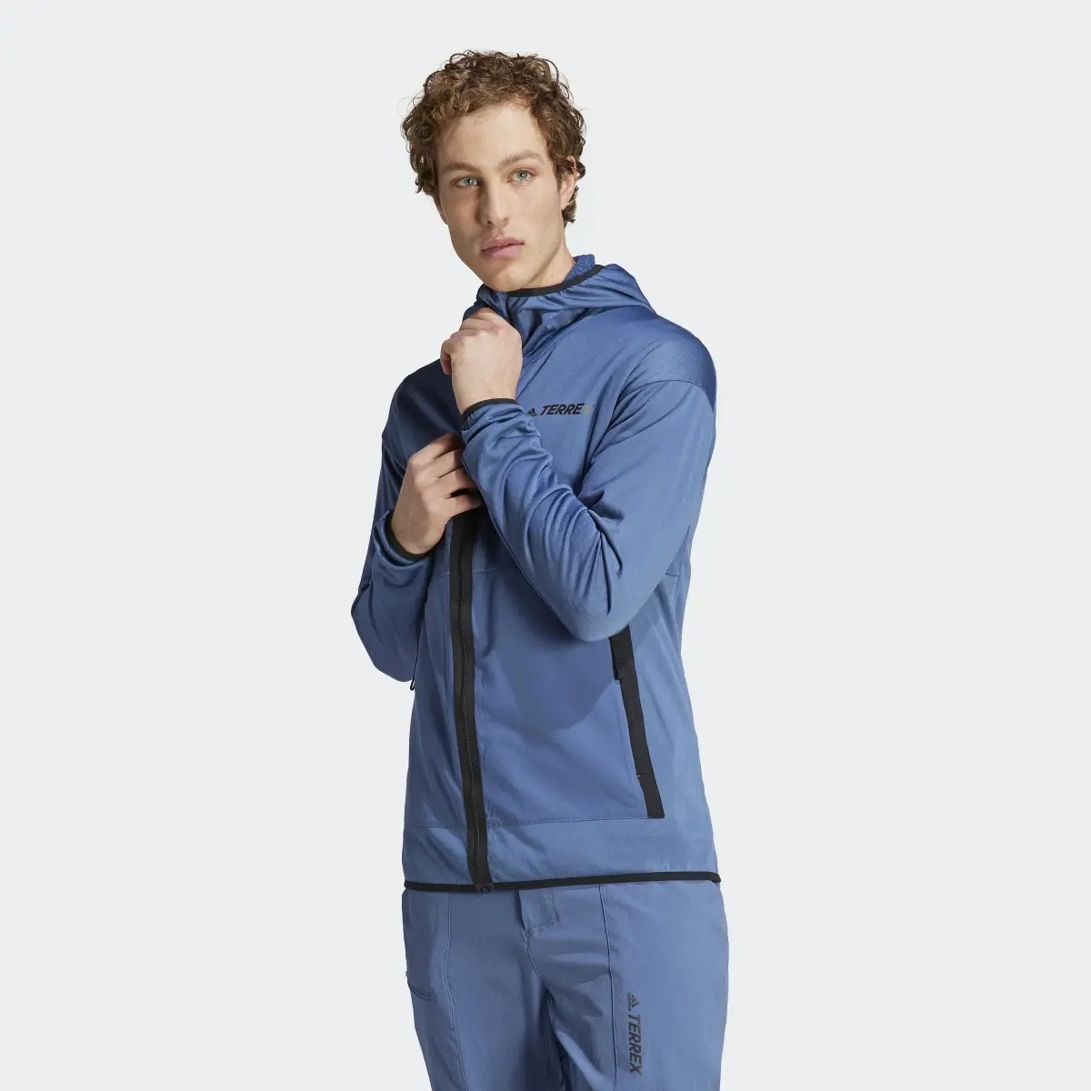 Adidas TERREX Tech Fleece Light Hooded Hiking Jacket. 2