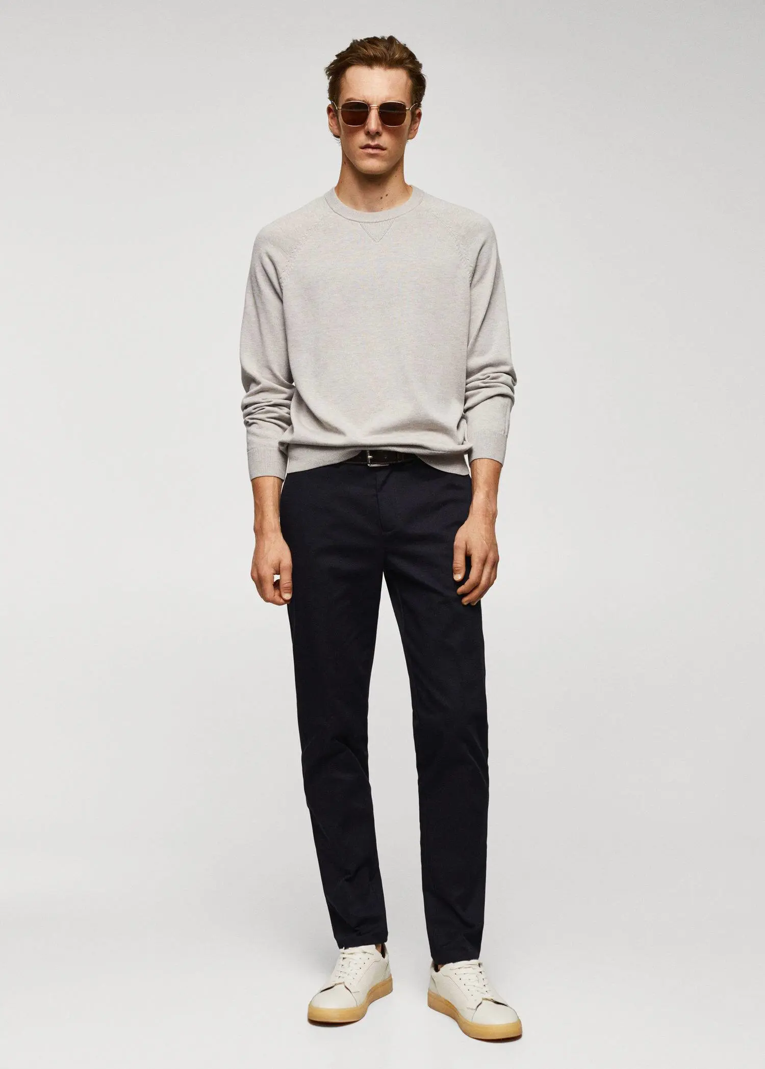 Mango Fine-knit cotton sweater. a man in a white shirt and black pants. 