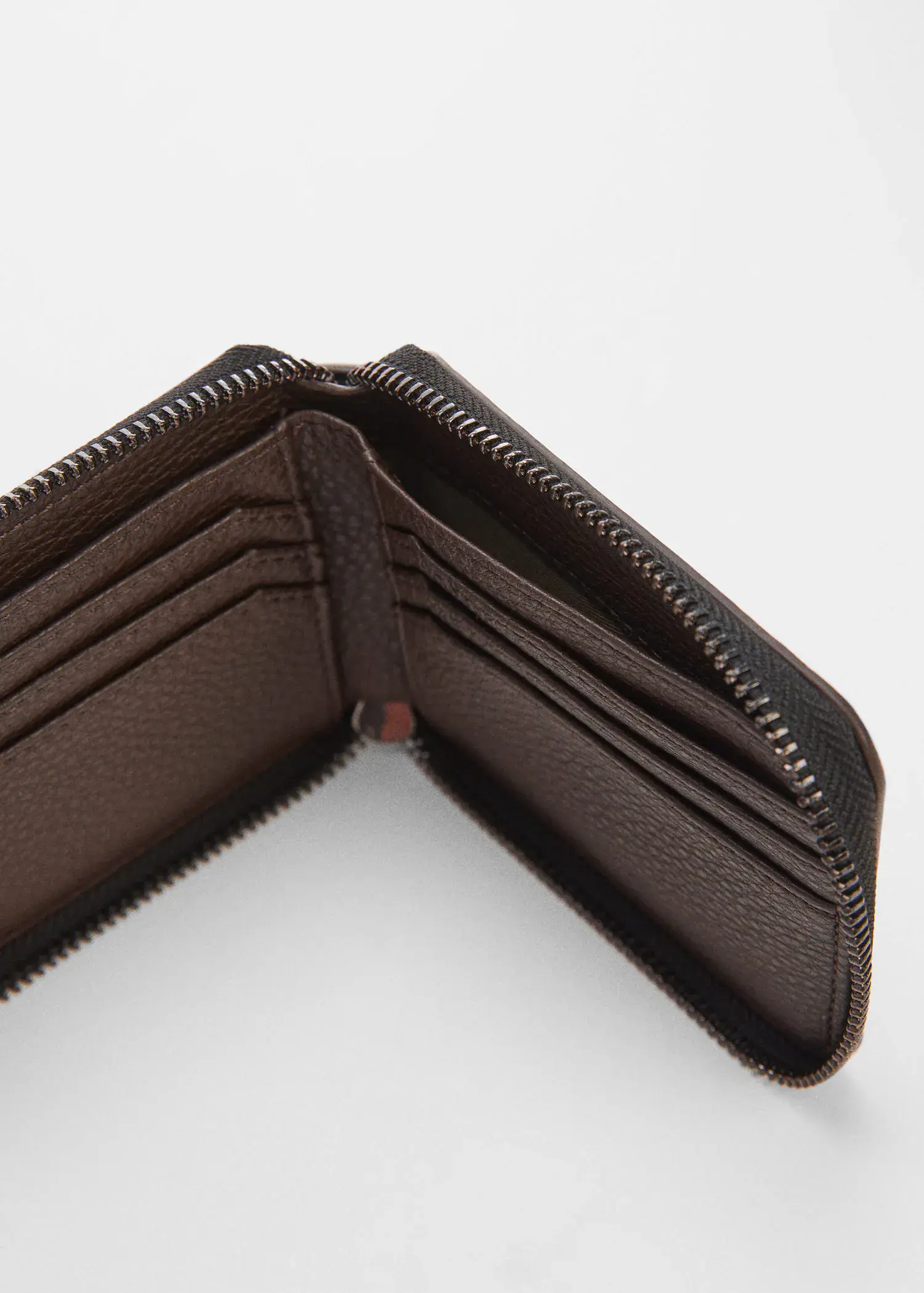 Mango Anti-contactless wallet. a close-up of the inside of a brown wallet. 