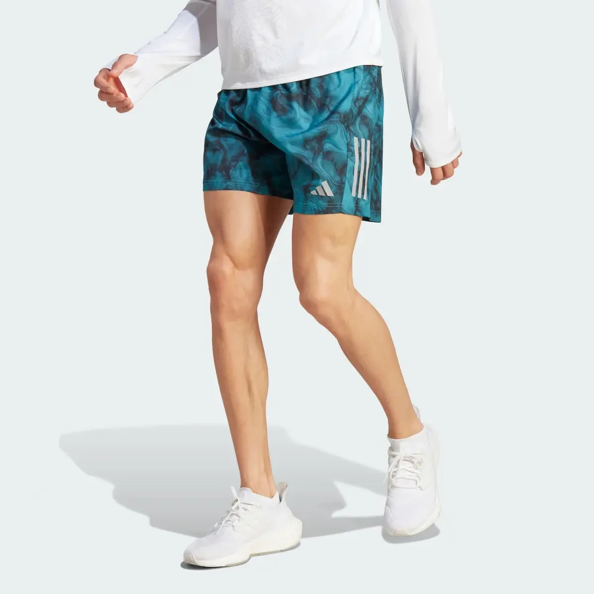 Adidas Own the Run Allover Print Shorts. 1