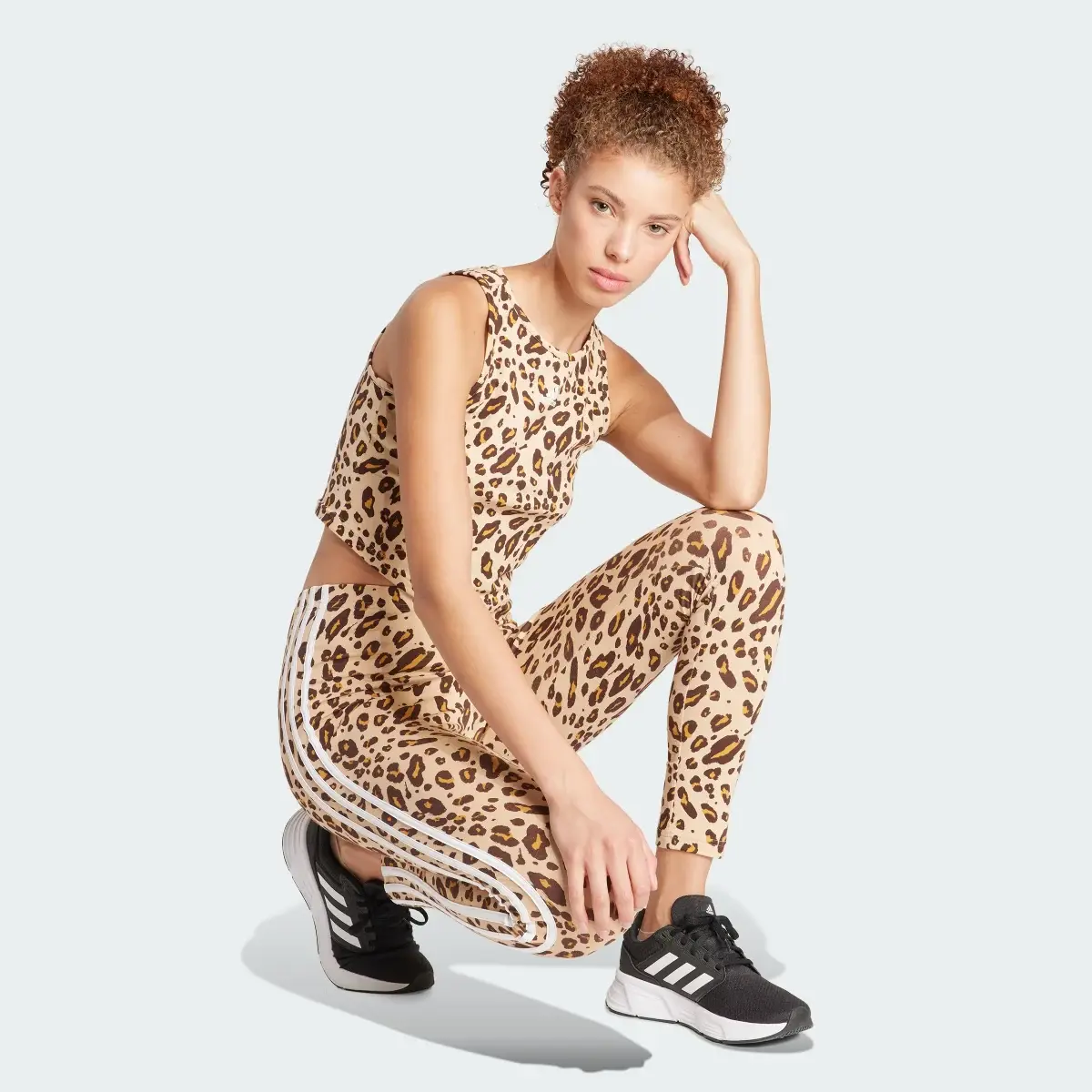 Adidas Essentials 3-Stripes Animal Print Leggings. 3