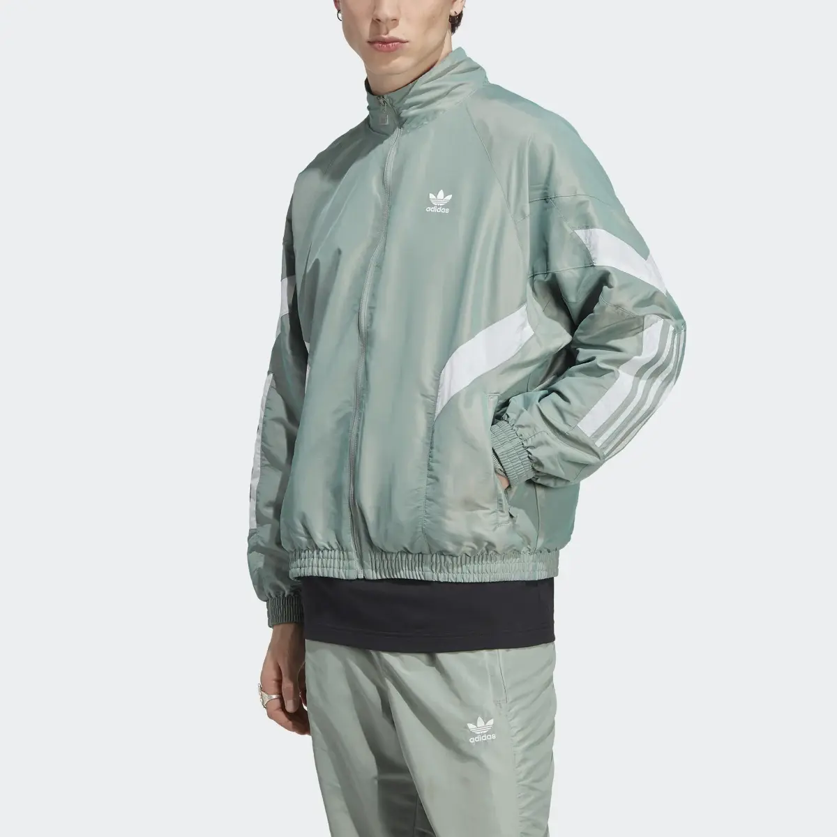 Adidas Track jacket adidas Rekive Woven. 1