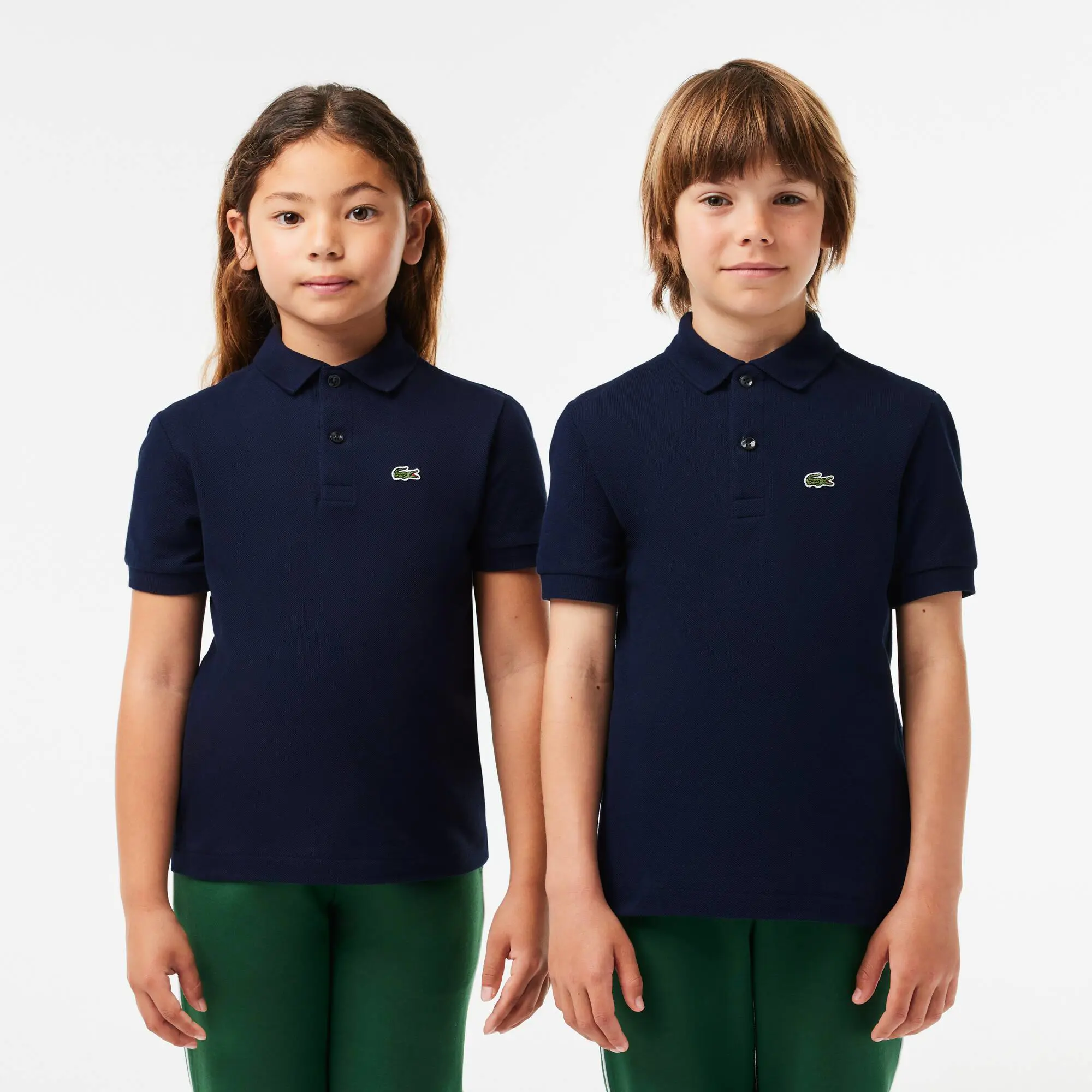 Lacoste Kids' Regular Fit Petit Piqué Polo. 1