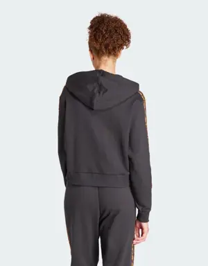 Adidas Felpa con cappuccio Essentials 3-Stripes Animal Print Relaxed. 3 Adidas Felpa con cappuccio Essentials 3-Stripes Animal Print Relaxed. 3