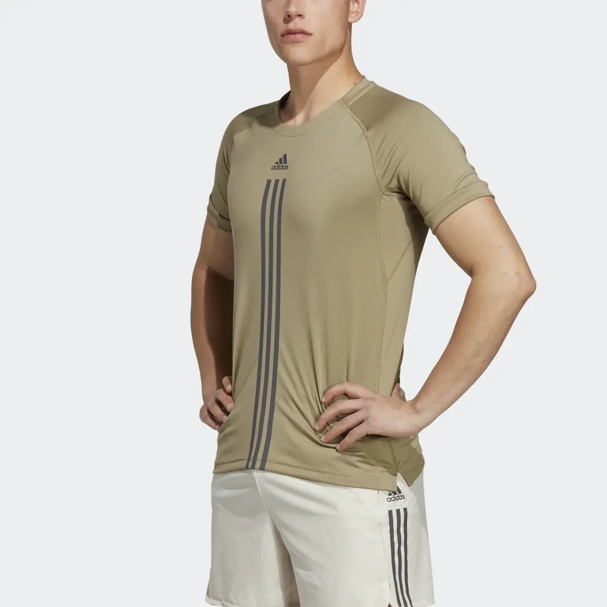 Adidas AlphaStrength Tee. 1