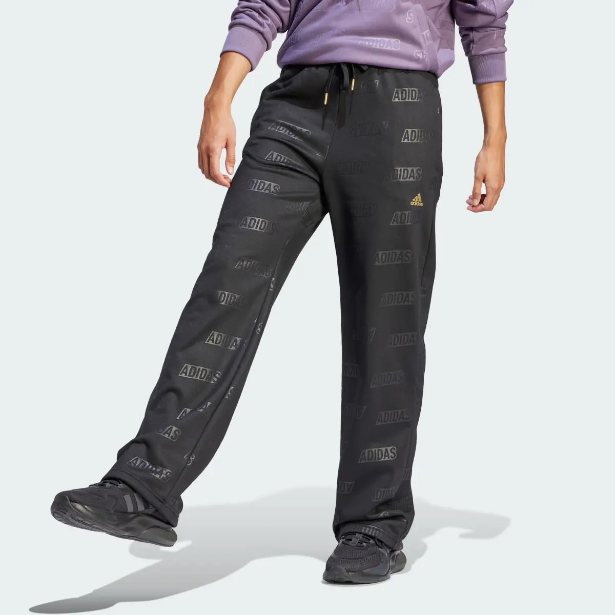 Adidas Embossed Monogram Fleece Pants. 1
