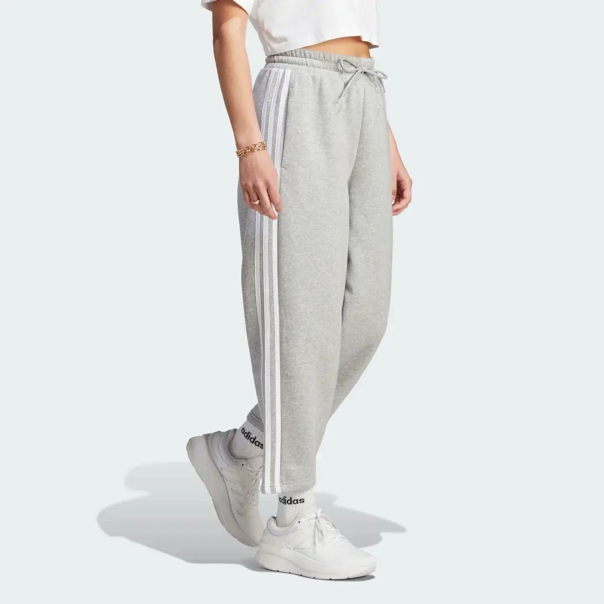 Adidas Essentials 3-Stripes Open Hem Fleece Pants. 3