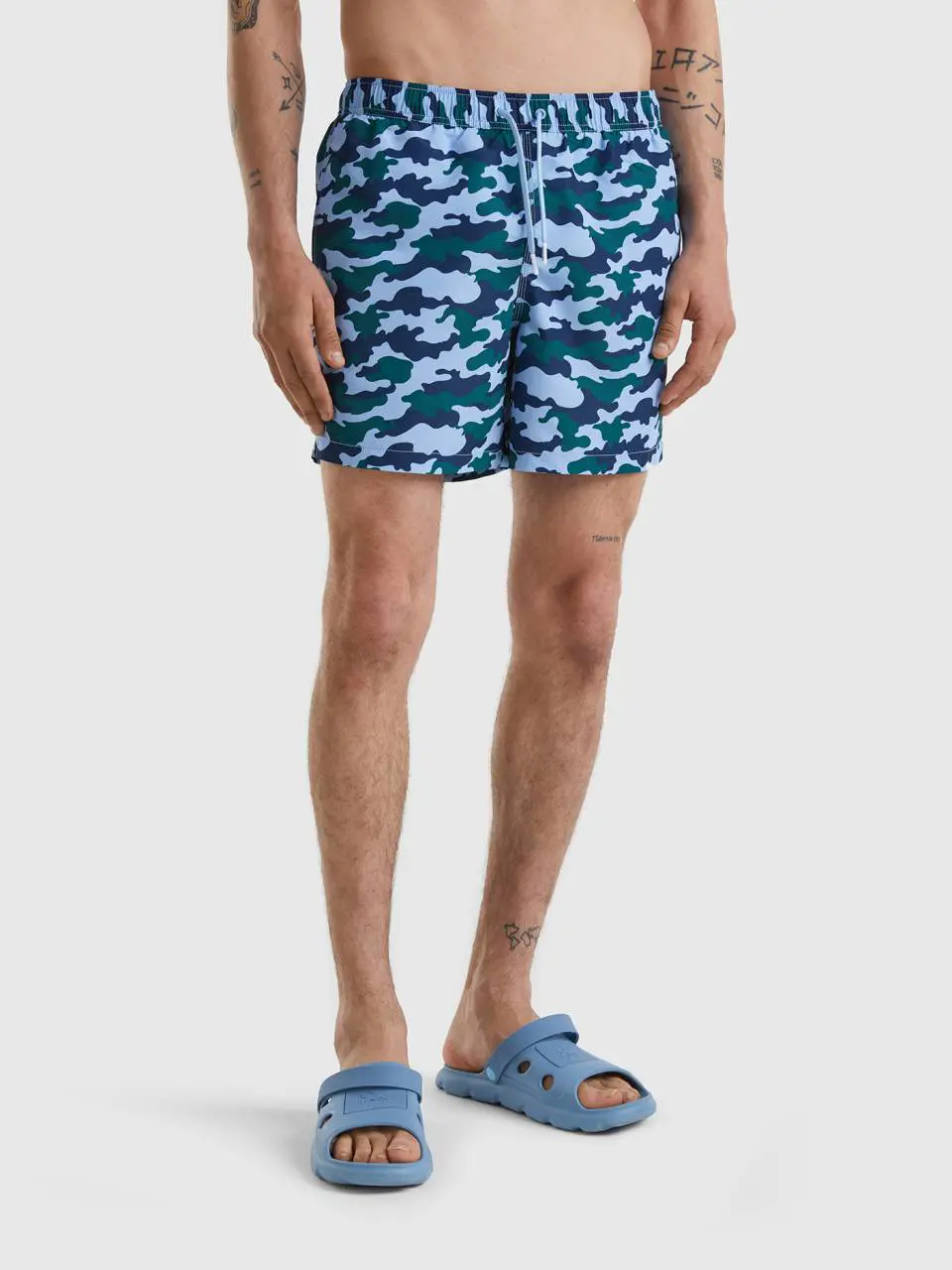 Benetton swim trunks with camouflage print. 1