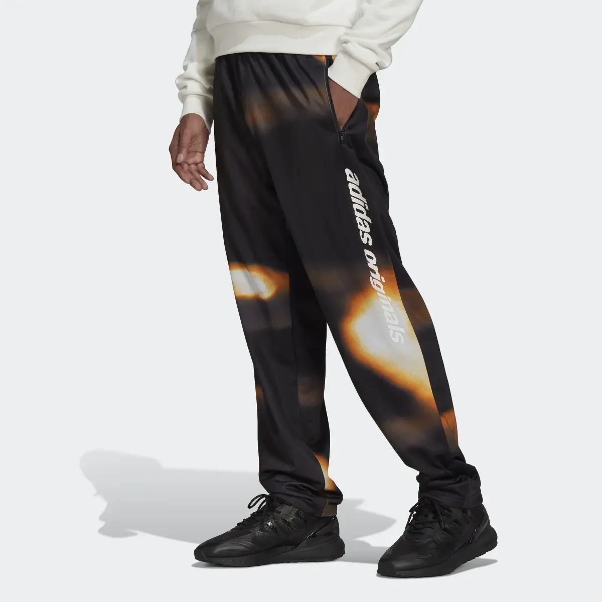 Adidas Track pants Graphics Y2K. 1