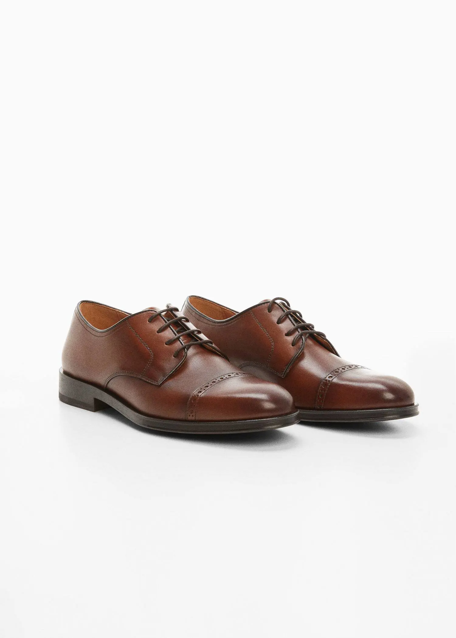 Mango Leather suit shoes. a pair of brown dress shoes on a white background 