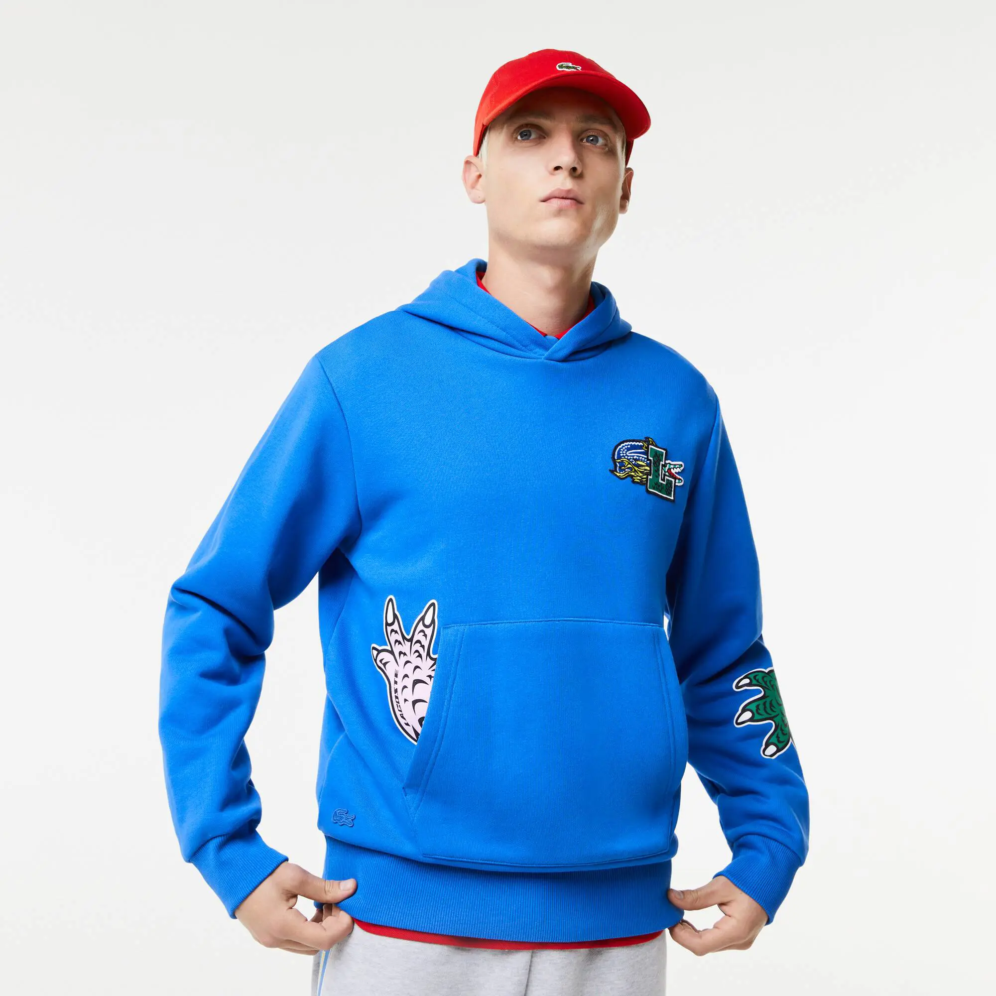 Lacoste Sudadera de hombre Lacoste Holiday con capucha y estampado de efecto cómic. 1