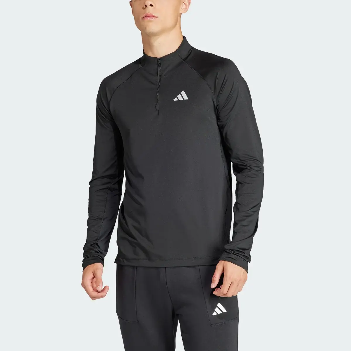 Adidas Gym+ Training 1/4-Zip Long Sleeve Tee. 1