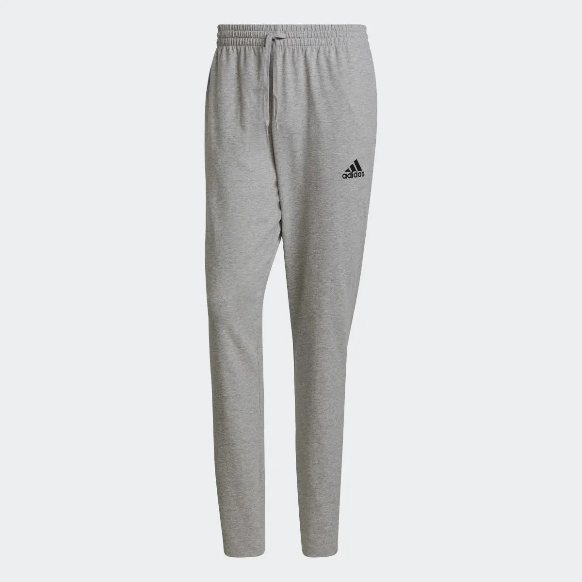 Adidas Essentials Tapered Joggers. 1