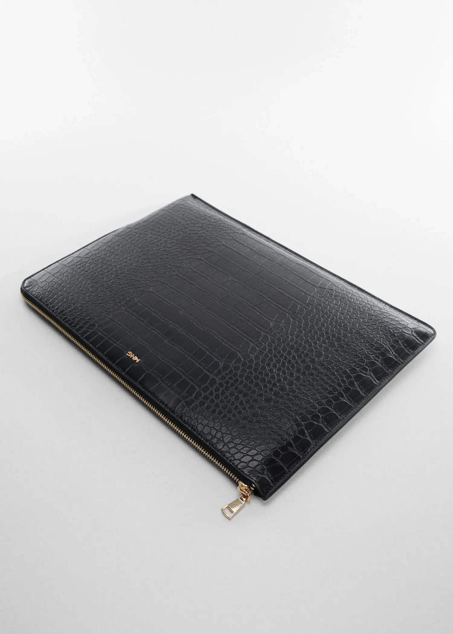 Mango Animal print laptop case. a laptop case that is black and has a gold zipper. 