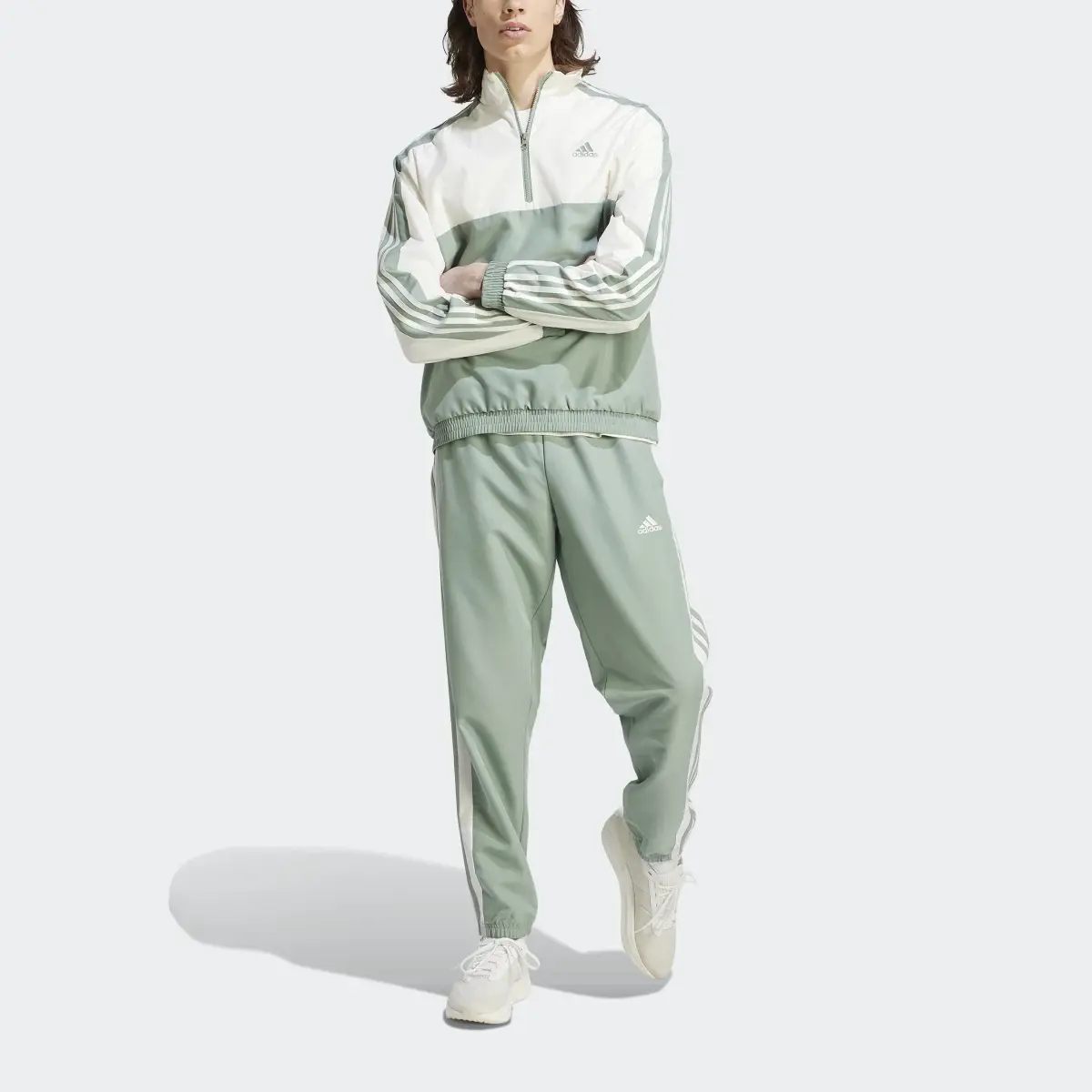 Adidas 1/4 Zip Woven Track Suit. 1