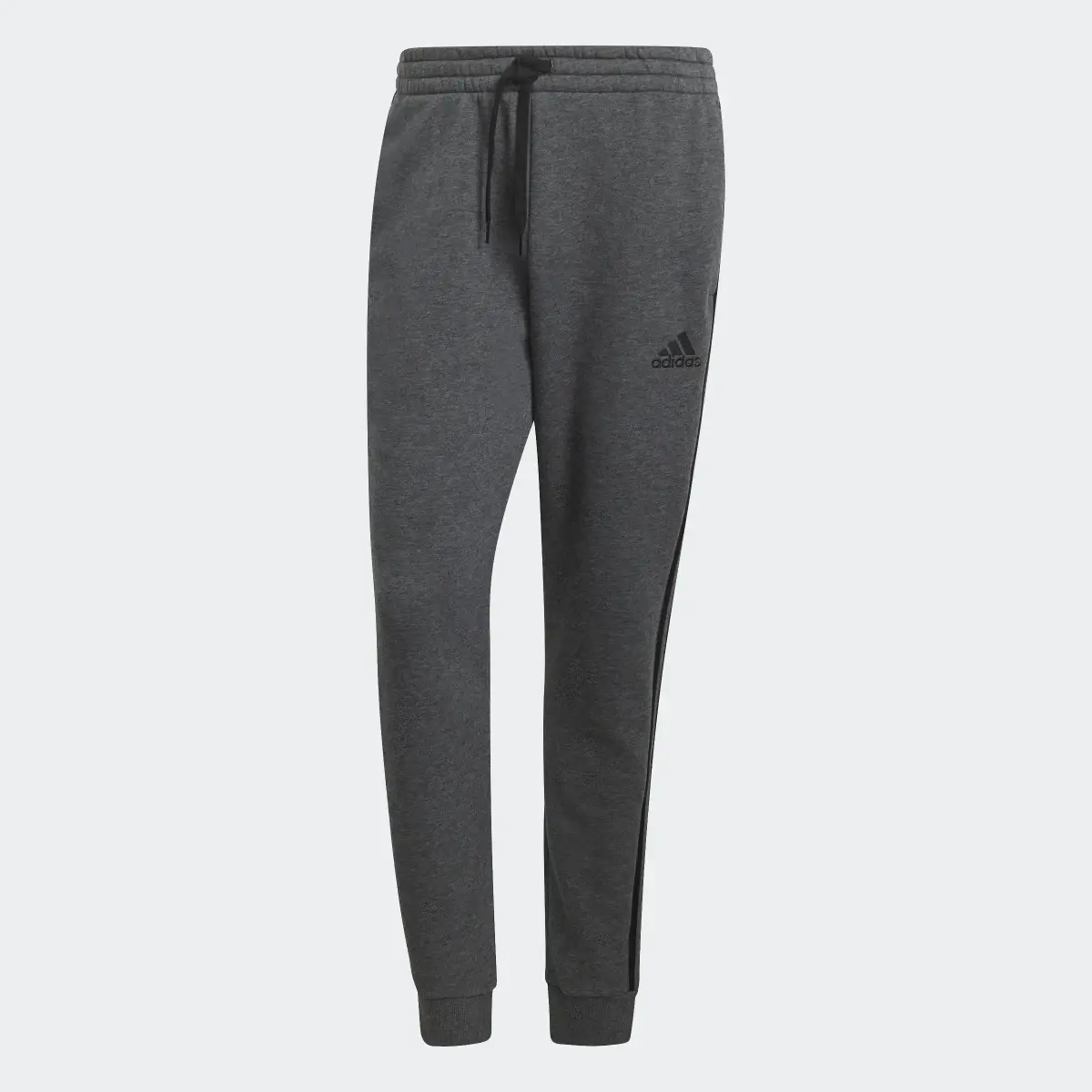 Adidas Pantaloni Essentials Fleece Tapered Cuff 3-Stripes. 1