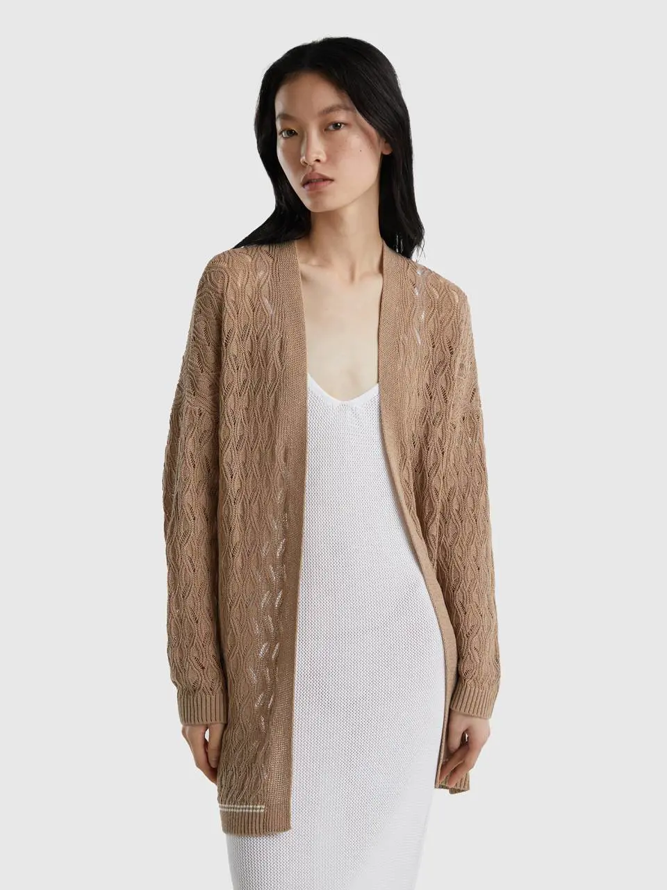 Benetton open-knit cardigan in lace stitch. 1