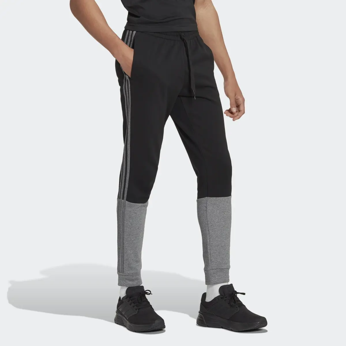 Adidas Essentials Mélange French Terry Joggers. 3