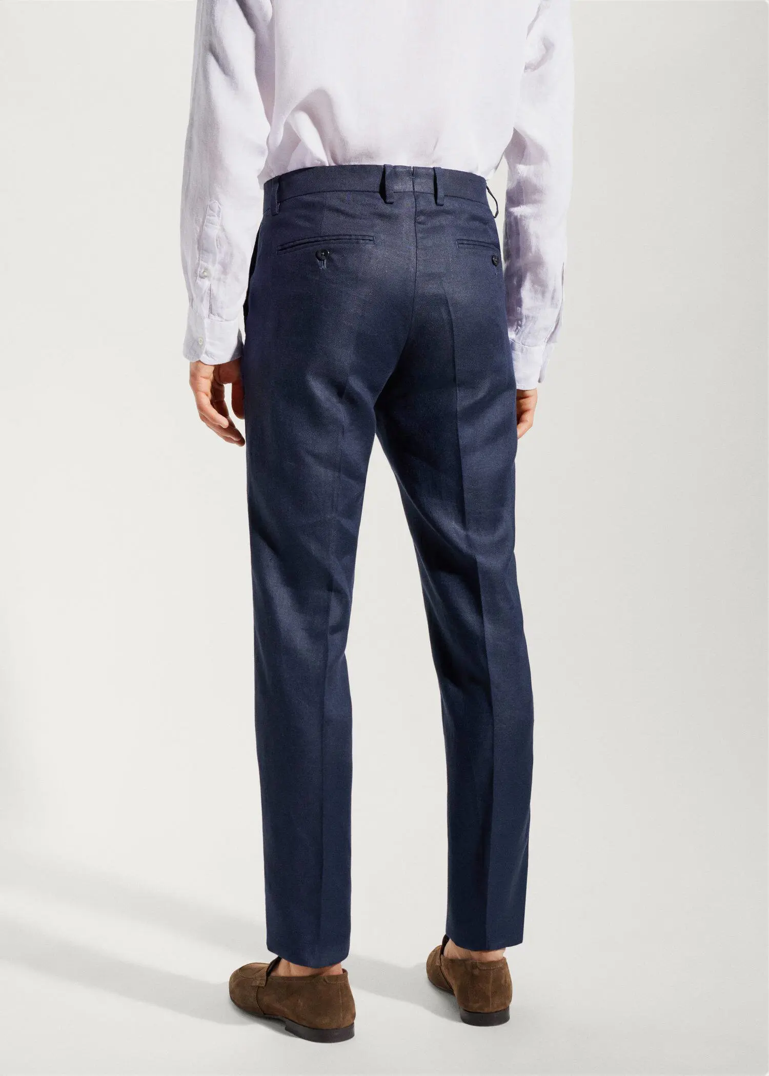 Mango 100% linen suit trousers. a man wearing a suit and a white dress shirt. 